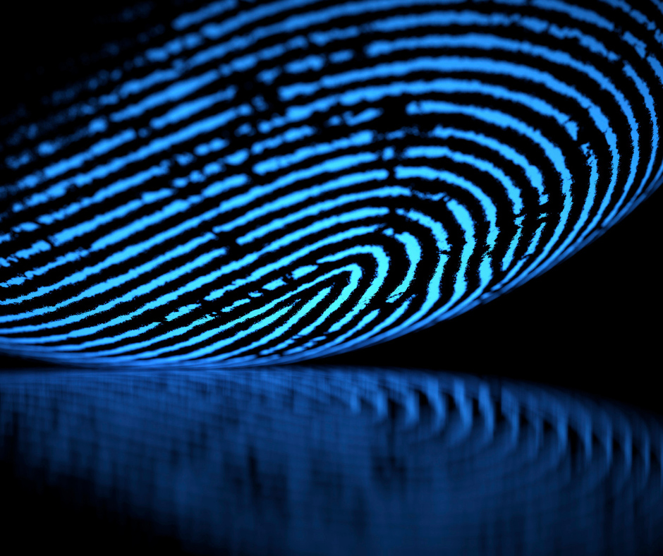 Close-up of a glowing blue fingerprint representing biometric authentication in digital identity verification, aligning with NIST SP 800-63 guidelines.