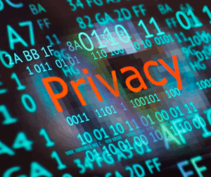 The word 'Privacy' displayed in red among streams of glowing binary code, representing data protection in digital identity systems