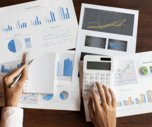 A professional analyzing charts to represent the banking sector and the need for secure data protection