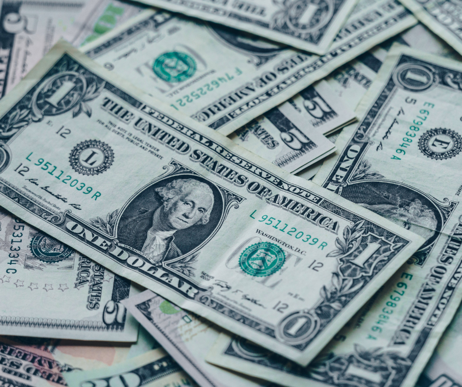 US dollar bills representing financial assets that IAM systems protect against fraud and unauthorized access in banking