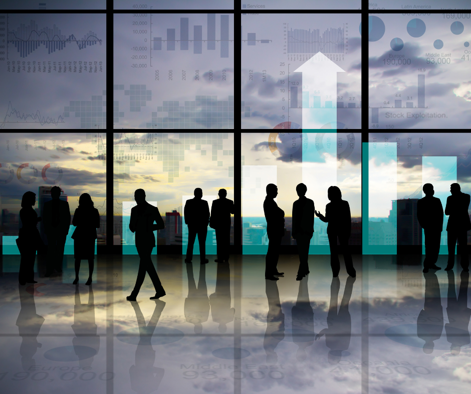 Silhouettes of business professionals with charts in background representing identity management using sailpoint