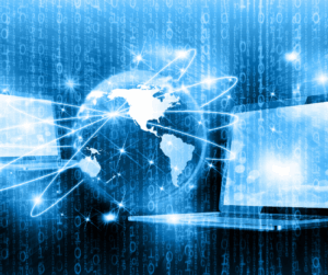A globe and laptops, showing the interconnected nature on identity management platforms